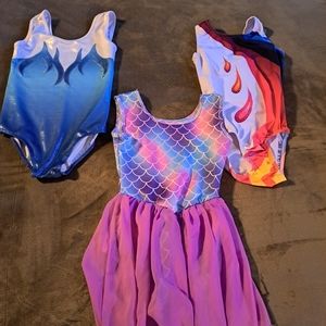 3 girl size 7 gymnastic leotards